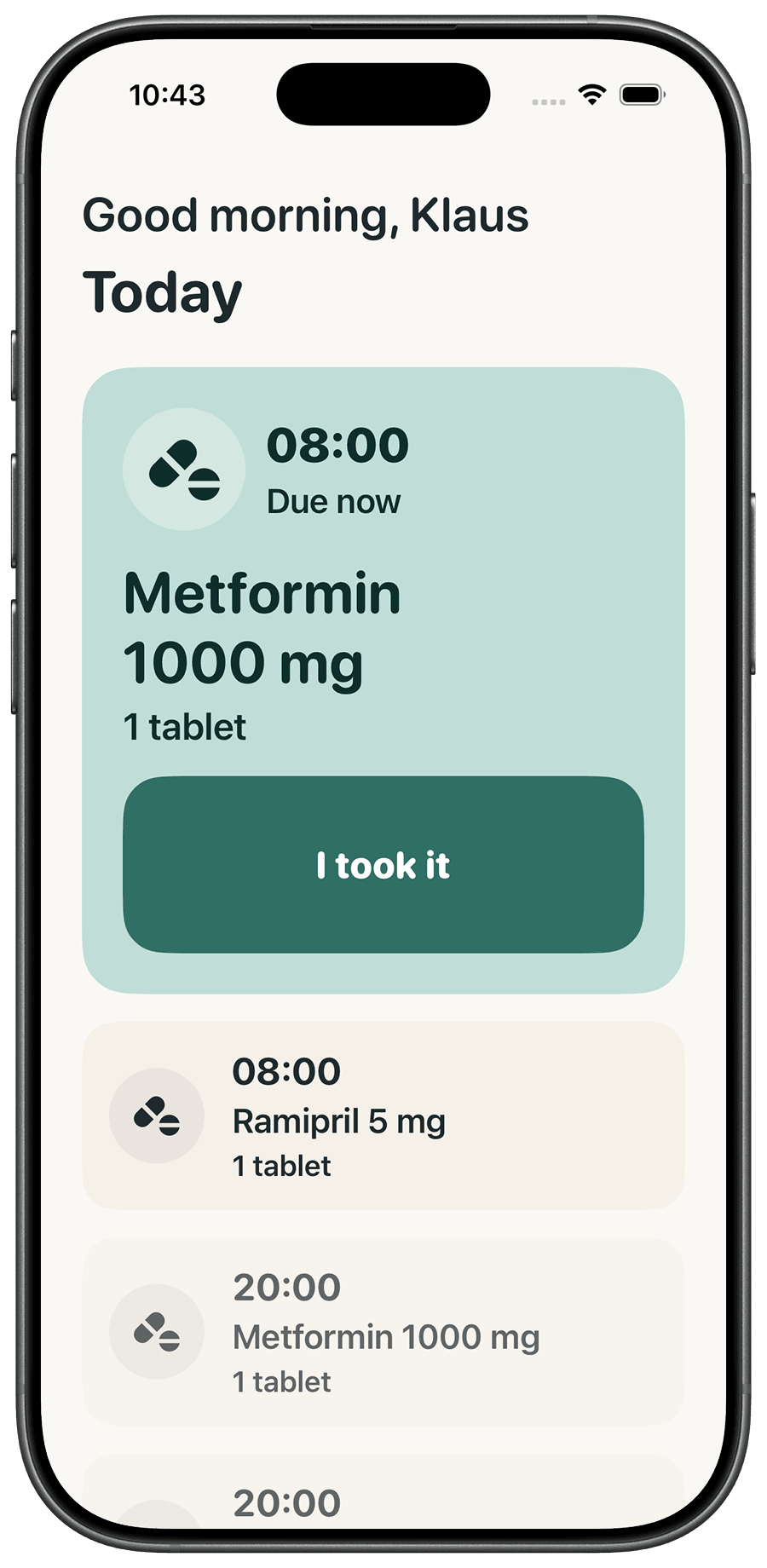 iPhone showing Skova’s screen for the person taking the medication: “Good morning, Klaus”, a Metformin 1000 mg dose due at 08:00, and a large “I took it” button